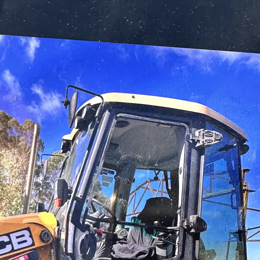 Cab glass replacement on JCB construction machinery